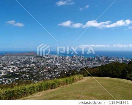 Park in the mountains with view of Diamondhead and the city of Honolulu on Oahu on a nice day Park in the mountains with view of Diamondhead and the city of Honolulu on Oahu on a nice day 112943851