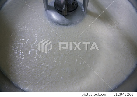 Sake during fermentation 112945205