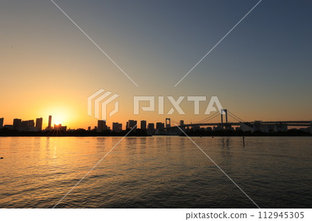 Cityscape at dusk with Rainbow Bridge visible Cityscape at dusk with Rainbow Bridge visible 112945305