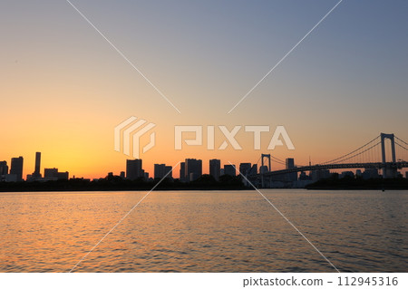 Cityscape at dusk with Rainbow Bridge visible Cityscape at dusk with Rainbow Bridge visible 112945316