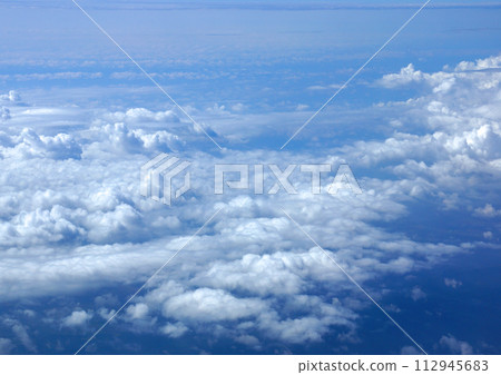 Fluffy Clouds above lands mass Fluffy Clouds above lands mass 112945683