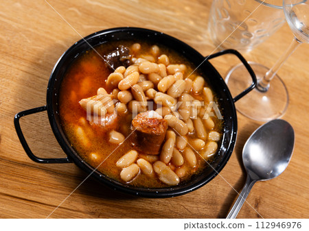 Asturian fabada soup served in bowl Asturian fabada soup served in bowl 112946976