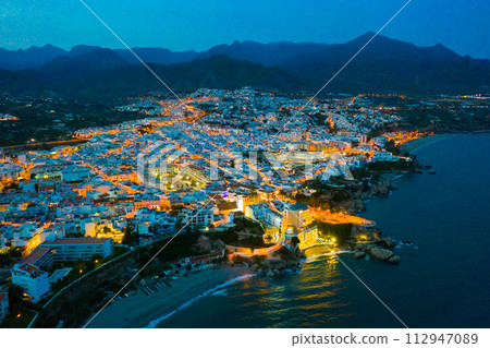 Nerja city with coastline in province of Malaga at night Nerja city with coastline in province of Malaga at night 112947089