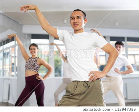 Group of young people dancing jazz funk 112947389