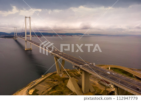 Osman Gazi Bridge spanning the Izmit Gulf, Turkey. 112947779