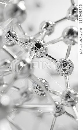 AI-generated content. A macro photograph showcasing a silver body jewelry piece modeled after a molecule, with intricate patterns and symmetry, set against a white background 112949266