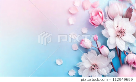 Spring pink flowers and petals on pastel blue background with copy space. Valentine's Day, 8 March, Mother's Day concept. Flat lay. Spring pink flowers and petals on pastel blue background with copy space. Valentine's Day, 8 March, Mother's Day concept. Flat lay. 112949699