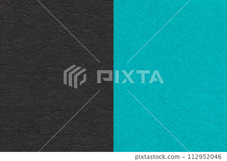 Texture of craft black and turquoise paper background, half two colors, macro. Vintage cerulean cardboard. Texture of craft black and turquoise paper background, half two colors, macro. Vintage cerulean cardboard. 112952046