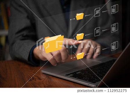 IT working on computer Business processes Document Management System DMS business processes and ensuring digital security. store, share, and organize documents and files.. 112952275