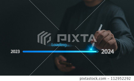 loading progress bar to 2024 Businessman using mobile phone investment and planning marketing finance and target growth success.. 112952292