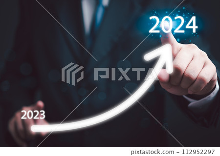 loading progress bar to 2024 Businessman tounching arrow investment and planning marketing finance and target growth success.. loading progress bar to 2024 Businessman tounching arrow investment and planning marketing finance and target growth success.. 112952297