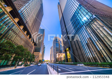 Tokyo cityscape in Japan View of the office district against the blue sky from the intersection in front of Otemachi Station (Otemachi Gate in the back) Tokyo cityscape in Japan View of the office district against the blue sky from the intersection in front of Otemachi Station (Otemachi Gate in the back) 112953348