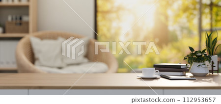 A space for display products on a working desk in a contemporary minimalist living room. 112953657