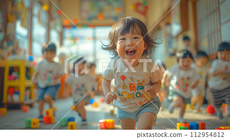 Kids playing in a nursery 112954812