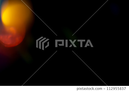 Multicolored bright highlights on a black background. for overlay to create a festive, vibrant effect, abstract background Multicolored bright highlights on a black background. for overlay to create a festive, vibrant effect, abstract background 112955837