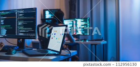 asian woman  and Indian man Developer team working  about devops programming software data online  at night in office 112956130