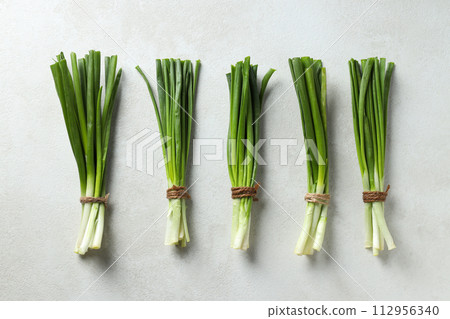 Green onion, concept of fresh vegetable, fresh raw food Green onion, concept of fresh vegetable, fresh raw food 112956340