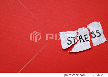 Stress theme concept, inscription on torn paper. 112956353