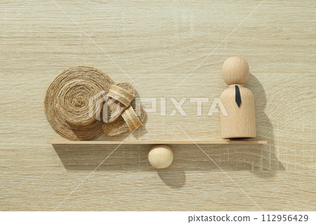Work-life balance concept, visual symbols, on a light background. Work-life balance concept, visual symbols, on a light background. 112956429