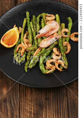 Asparagus stir fried with shrimp. 112956453
