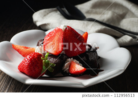 Strawberry (Amaou) and brownie with chocolate sauce Strawberry (Amaou) and brownie with chocolate sauce 112956513