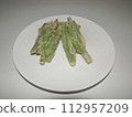 Green bean tempura on a white plate 112957209
