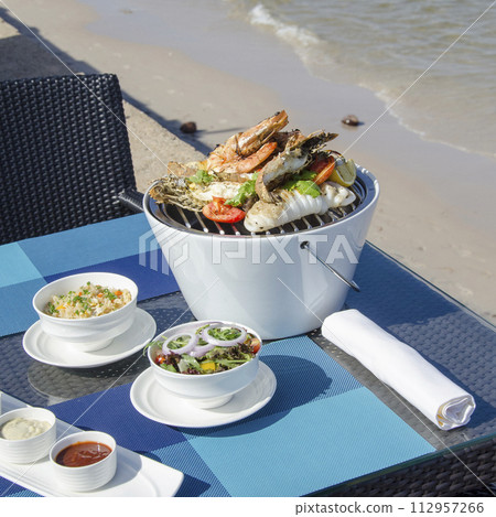 Vegan Yoga Girl Holds Healthy Whole Foods Plant Based Meal with Colorful Greens Quinoa Next to Swimming Pool 112957266