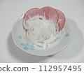 Fresh onion salad on a plate 112957495