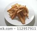 French fries on a plate 112957911