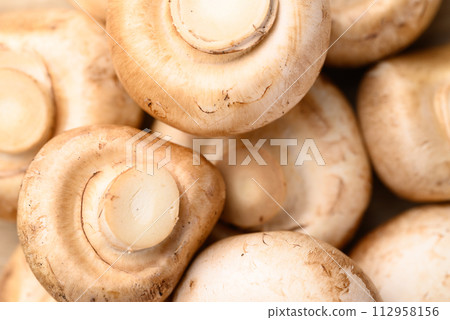 Fresh Champignon mushroom, food background 112958156