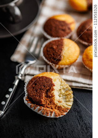 Close Up of a Muffins on black table. Close Up of a Muffins on black table. 112958326