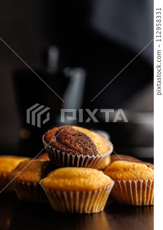 Close Up of a Muffins on black table. Close Up of a Muffins on black table. 112958331