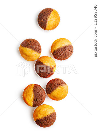 Close Up of a Muffins isolated on white background. Close Up of a Muffins isolated on white background. 112958340