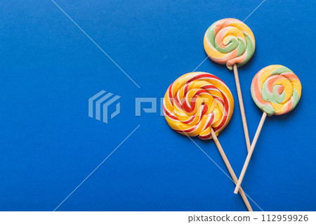 Set of colorful lollipops on colored background. Summer concept. Party Happy Birthday or Minimalist Concept 112959926