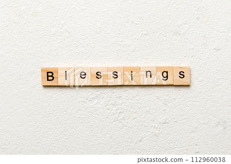 Blessings word written on wood block. Blessings text on cement table for your desing, Top view concept 112960038
