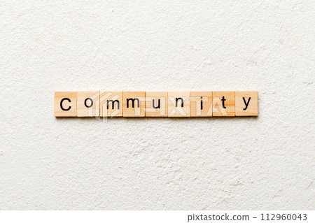 Community word written on wood block. Community text on table, concept Community word written on wood block. Community text on table, concept 112960043