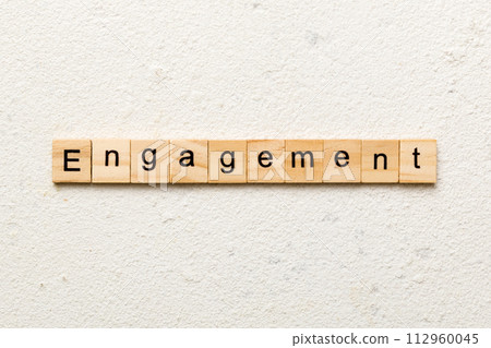 engagement word written on wood block. engagement text on table, concept 112960045