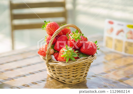 strawberries in a basket strawberries in a basket 112960214
