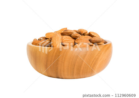 Roasted almonds in bowl isolated on white background. almonds is snack or raw of cook. Healthy food concept 112960609