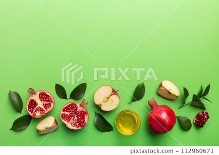 Flat lay composition with symbols jewish Rosh Hashanah holiday attributes on colored background, Rosh hashanah concept. New Year holiday Traditional. Top view with copy space 112960671