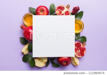 Flat lay composition with Blank flyer poster and symbols jewish Rosh Hashanah holiday attributes on colored background, New Year holiday Traditional. Top view with copy space mock up Flat lay composition with Blank flyer poster and symbols jewish Rosh Hashanah holiday attributes on colored background, New Year holiday Traditional. Top view with copy space mock up 112960674