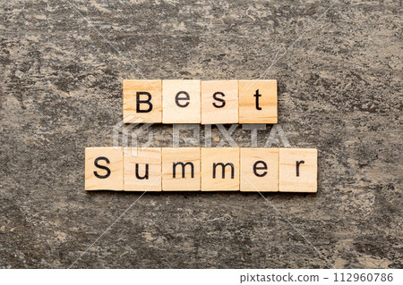 best Summer word written on wood block. best Summer text on cement table for your desing, concept 112960786