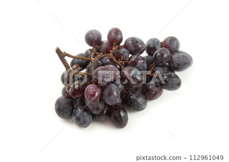 Bunch of organic black grapes isolated on white background. Bunch of organic black grapes isolated on white background. 112961049