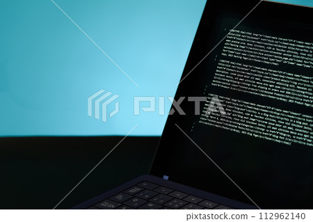 laptop placed in a dark room laptop placed in a dark room 112962140