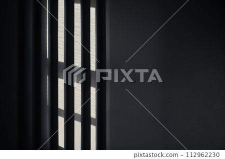 Abstract black background with geometric vertical slats, backdrop with copy space, light and shadow pattern. Stylish template, mock up for your design, art, poster, presentation. 112962230
