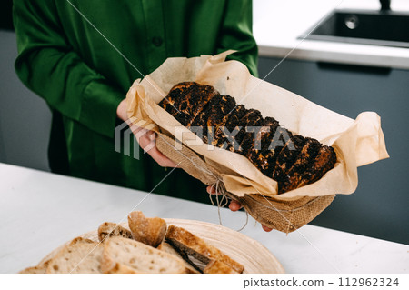 Poppy Seed Roll Close-Up on Baking Paper 112962324