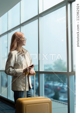 Airport travel and woman with passport, flight ticket or information of immigration, journey and luggage. identity document and international registration 112962924