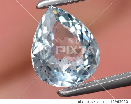 natural blue aquamarine gemstone on the background 112963610
