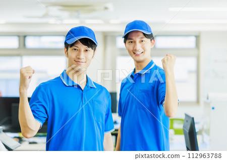 Sales driver doing a fist pump 112963788