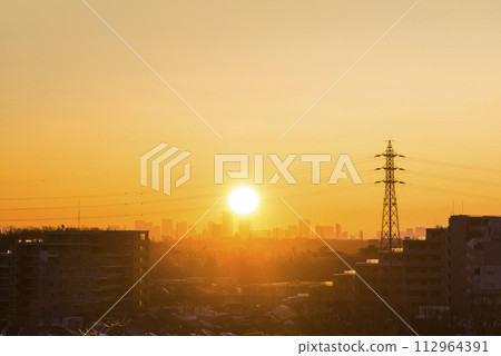 Sunrise over the residential area, sunrise, morning over the residential area, early morning, morning glow, morning sun, sun 112964391